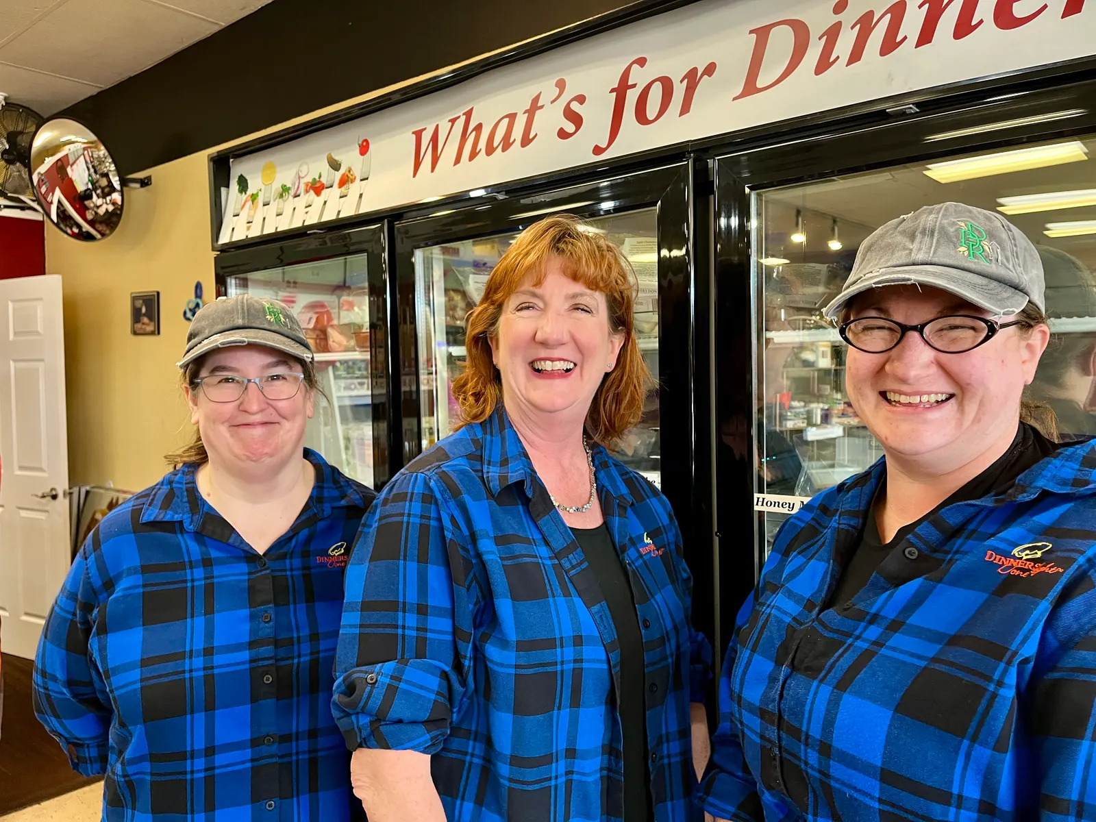 Dinners Done Right crew Beth, owner Vikki Bohlman, and Vikki's daughter